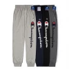 Champion Men's Jogger Slim Summer Classic Script. Charcoal Gray.